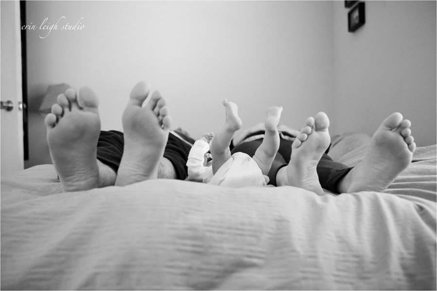 newborn feet with mom and dad feet