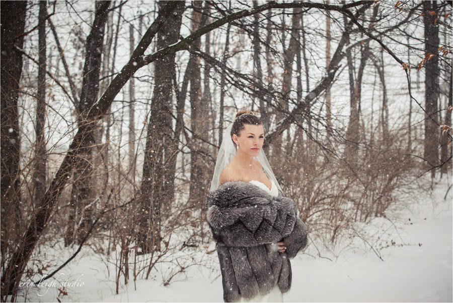 bride with fur jacket in snow