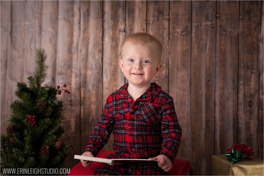 Christmas photo of kid reading book Olathe Photographer
